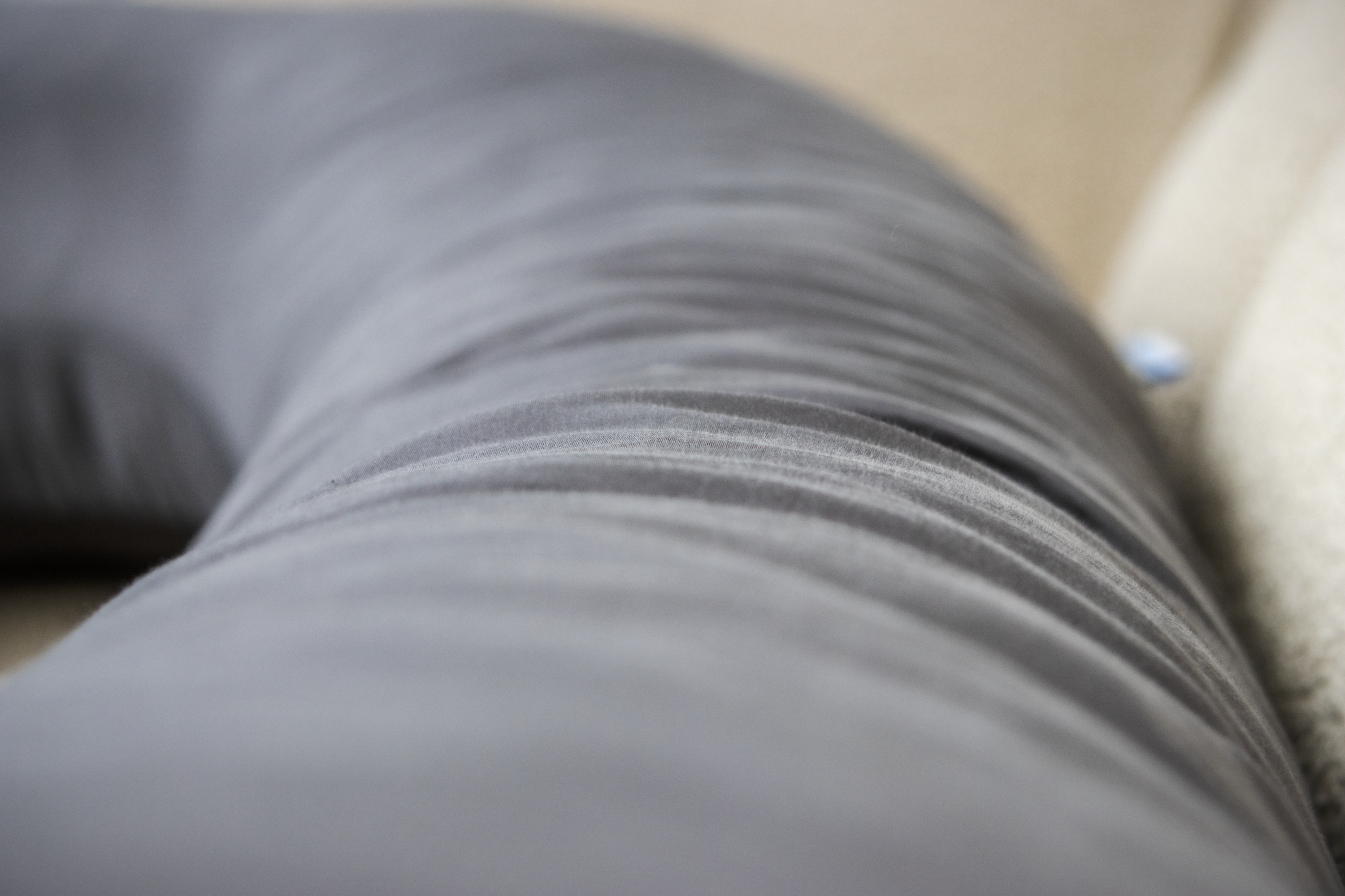 Close-up of Comfybud body pillow fabric texture, highlighting soft, breathable cover and premium comfort for sleep and support