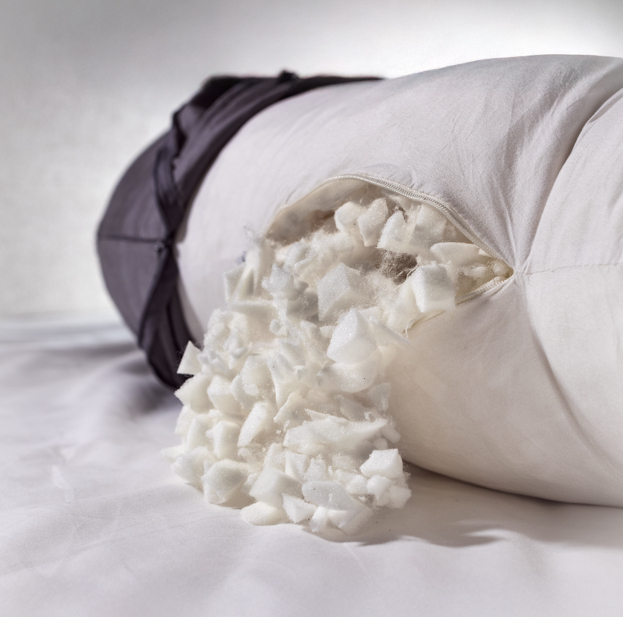 Close-up of Comfybud pregnancy and body pillow with shredded memory foam filling, showcasing soft, squishy, and supportive comfort